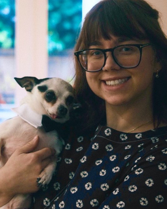 Samantha Ellis holding her dog